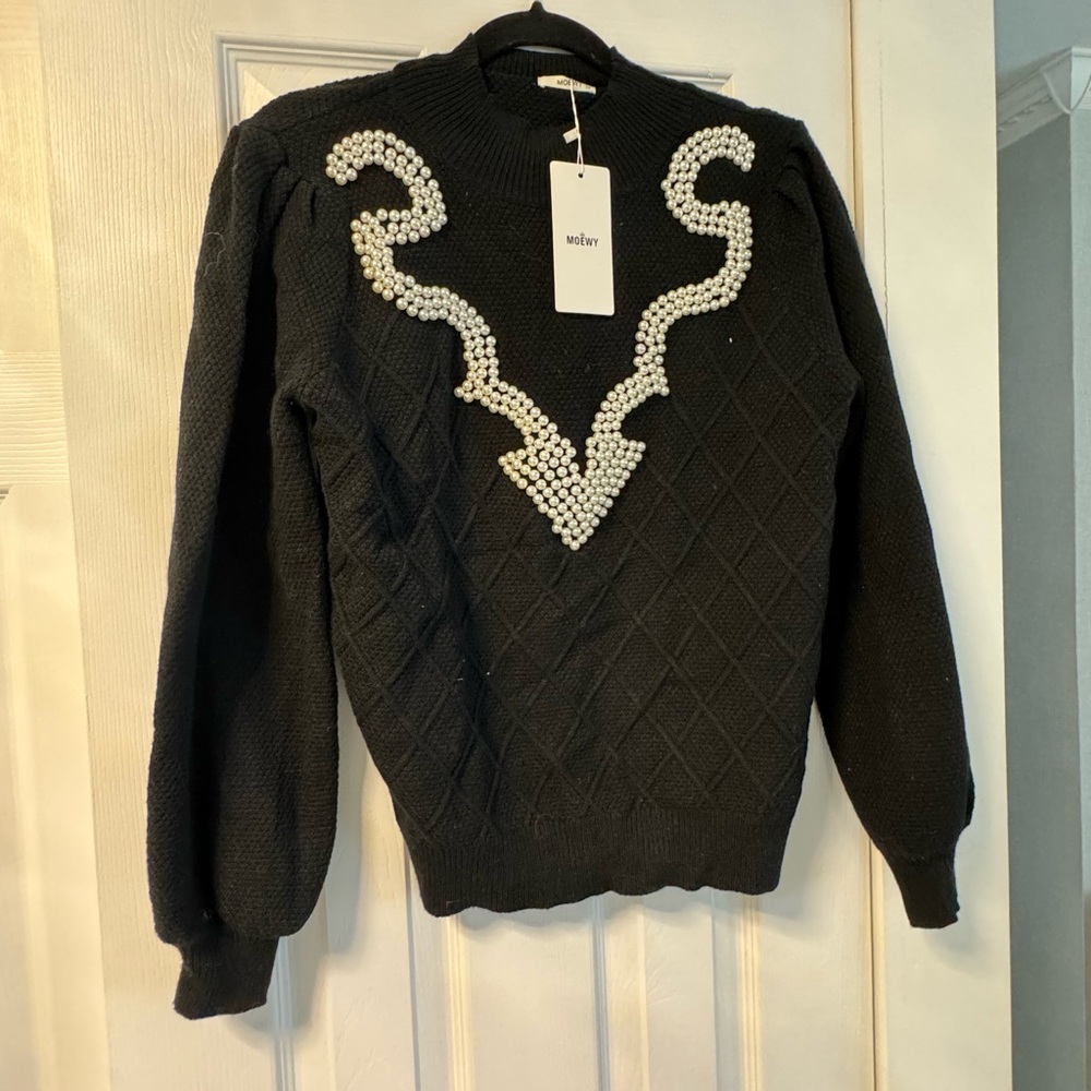 Black sweater with pearls